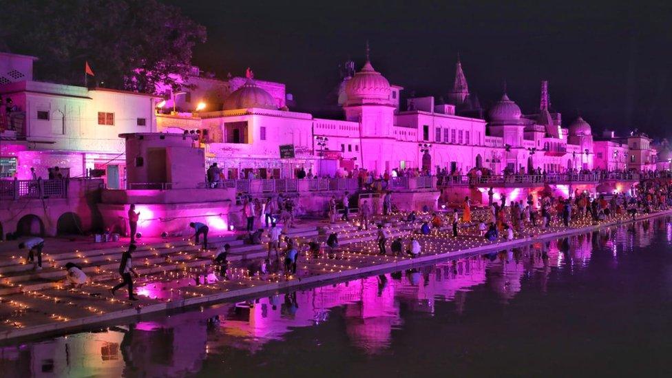 Hindu devotees floated lamps on the eve of the inauguration