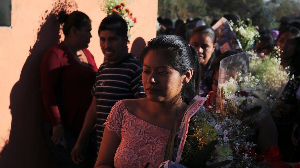 People take part in the funeral procession of Samir Flores Soberanes, 30, a Mexican activist