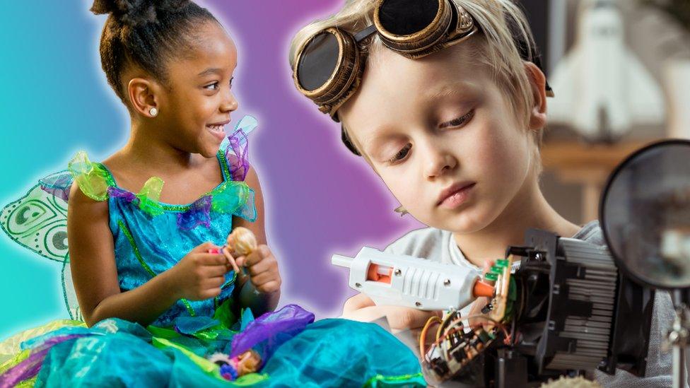 girl plays with doll, boy plays with circuit board