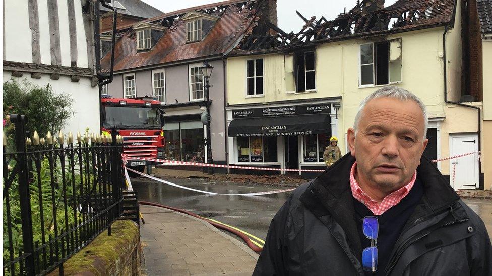 David Patrick in front of his shop