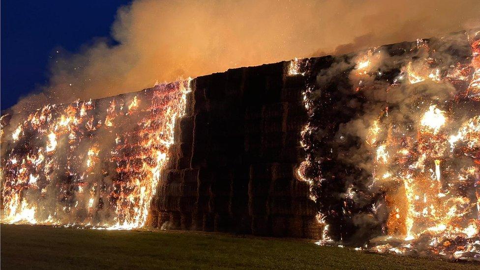 Straw stack on fire in Harlow, Essex