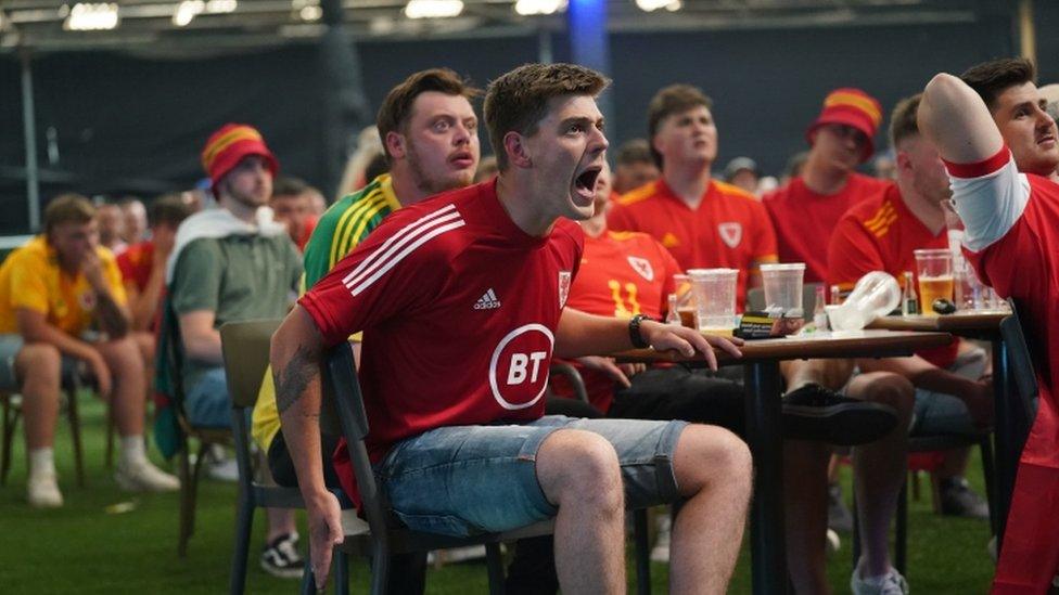 Friends got together to watch the game on a big screen in Cardiff