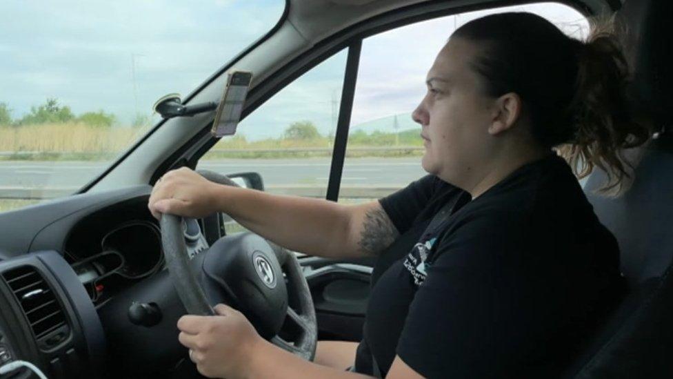 Abby Austen driving her van