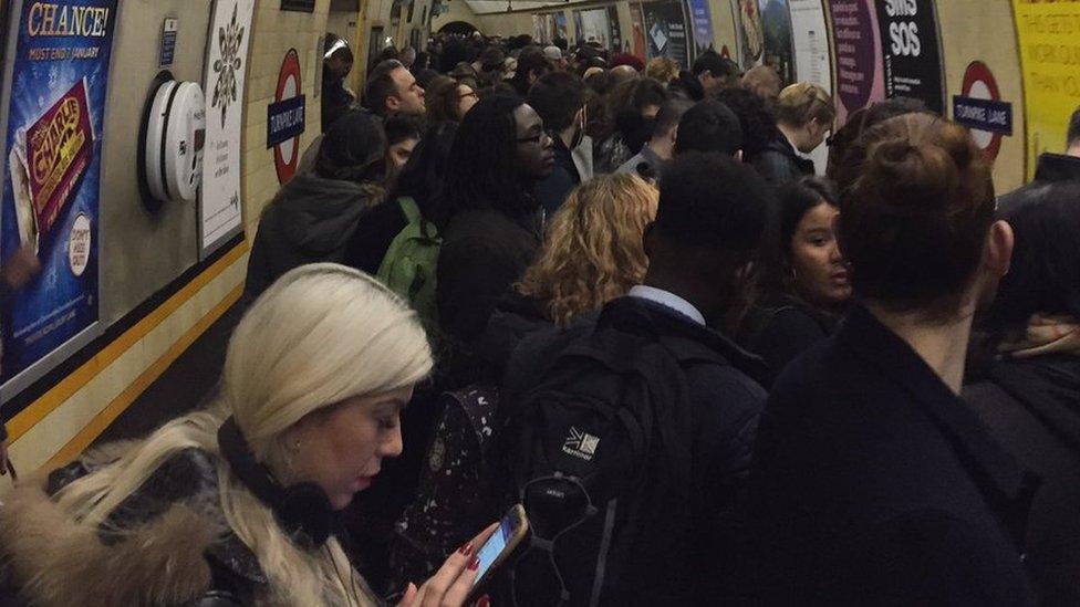 Commuters on a train platform