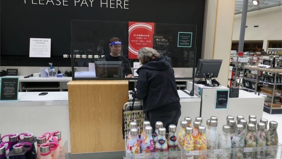 Shopper in John Lewis store