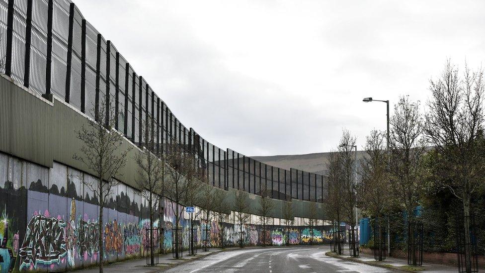 A peace wall that divides communities in Belfast