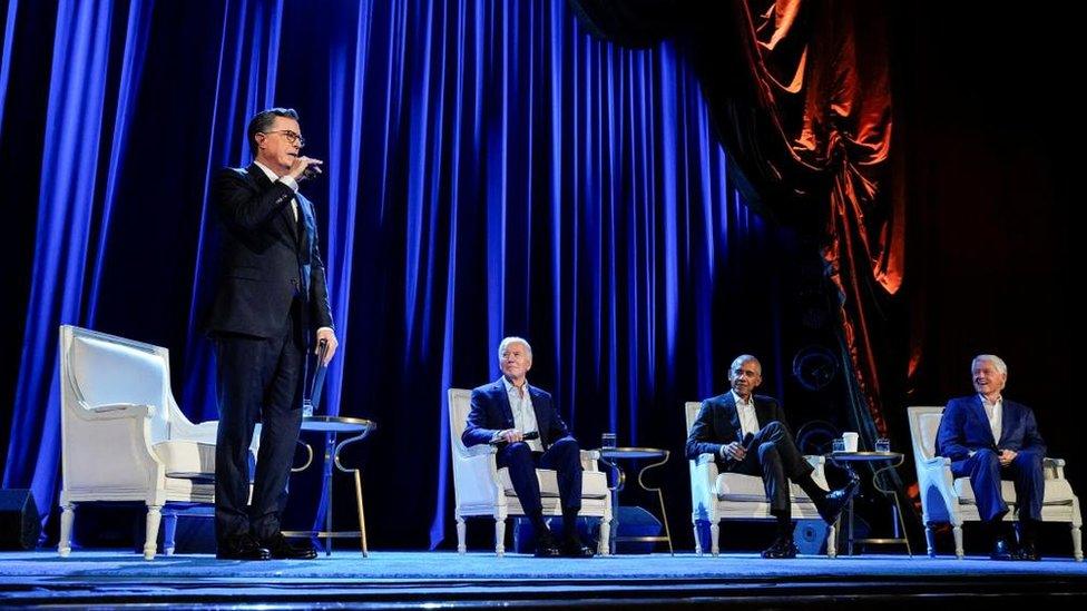 Stephen Colbert moderates a discussion with presidents Biden, Obama and Clinton.