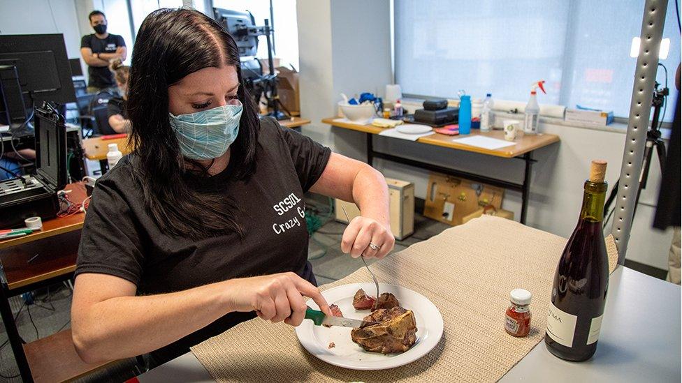 Heather cutting steak