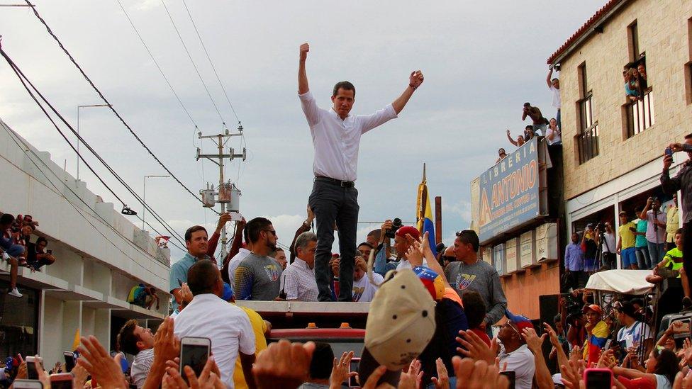 Venezuelan opposition leader Juan Guaidó, who many nations have recognised as the country's rightful interim ruler, attends a rally in Barquisimeto, Venezuela