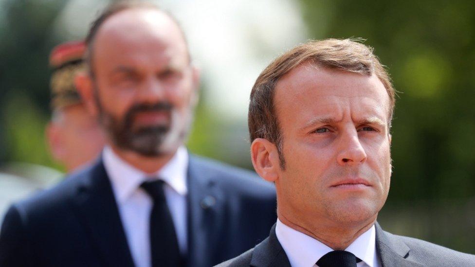 French President Emmanuel Macron (R) and French Prime Minister Edouard Philippe (L) file pic 18 June