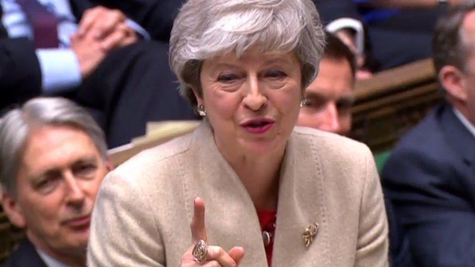 Theresa May speaking in Parliament and pointing her finger on the day MPs rejected her deal again