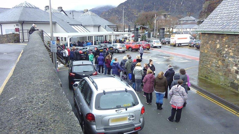 People queuing for bottled water in Blaenau Ffestiniog