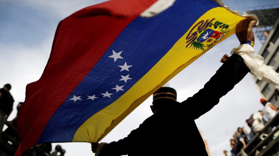 Opposition supporters attend a rally to pay tribute to victims of violence during protests against Venezuelan President Nicolas Maduro's government in Caracas, Venezuela, July 24, 2017.