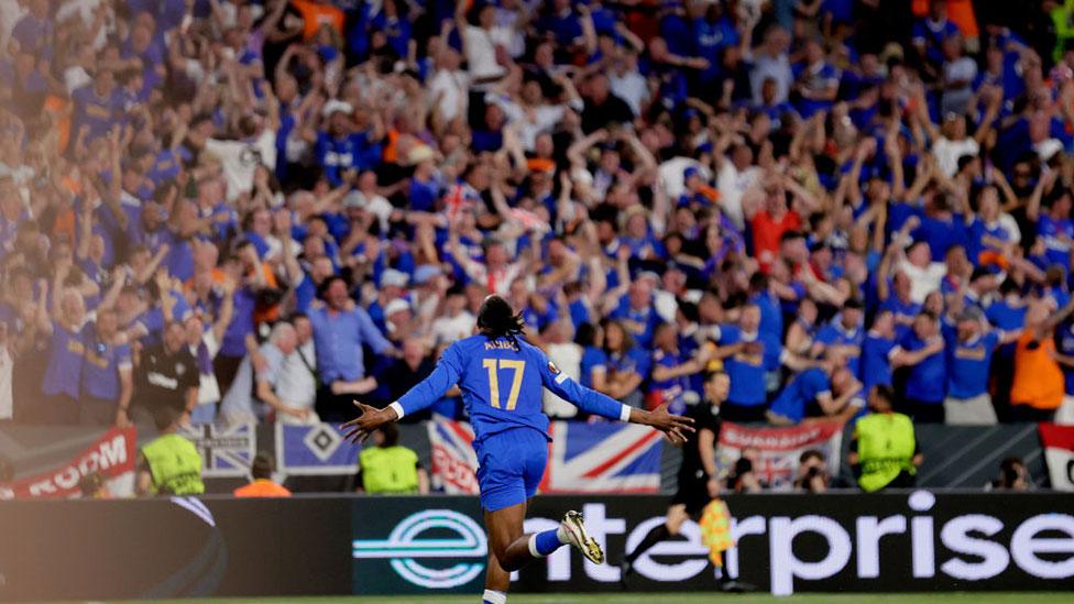 Aribo celebrates in front of Rangers fans