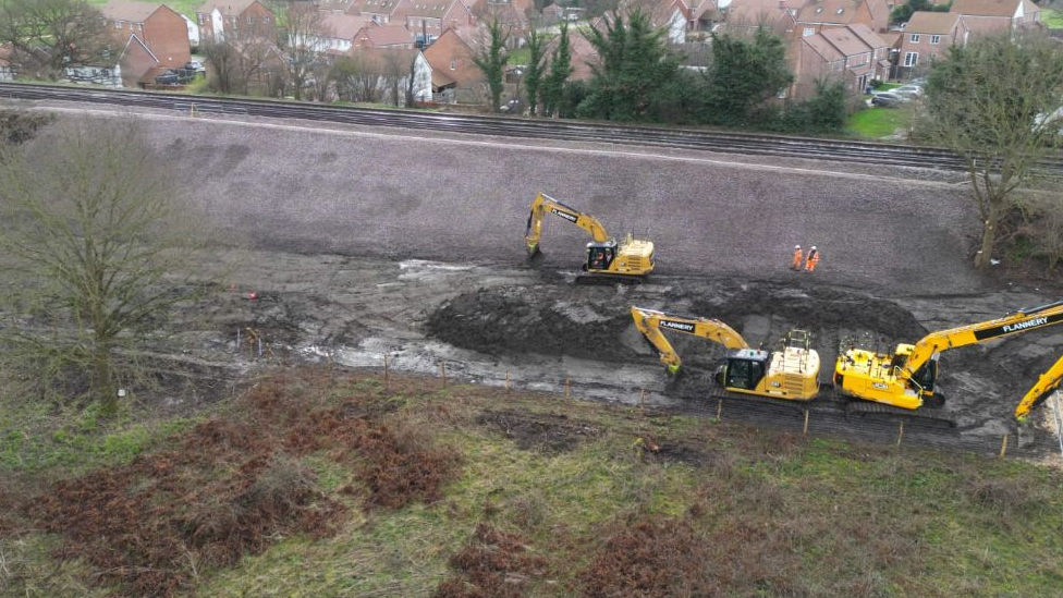 Diggers repairing the landslip at Newington