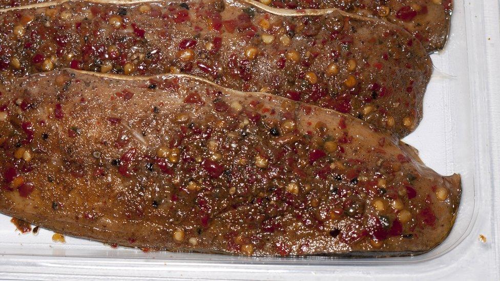 Shrink-wrapped peppered mackerel