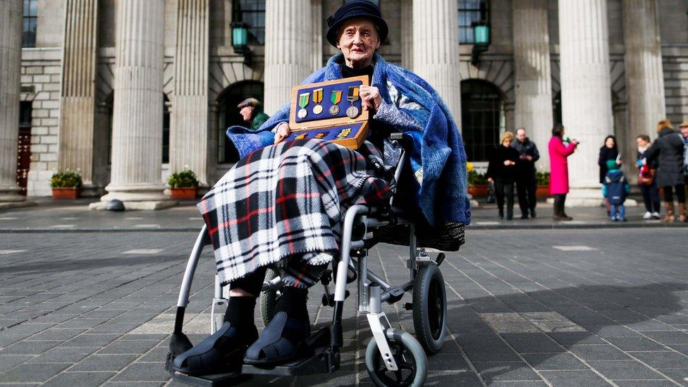 Sheila O'Leary, whose father Thomas Byrne fought in the GPO in 1916, holds a box of his medals