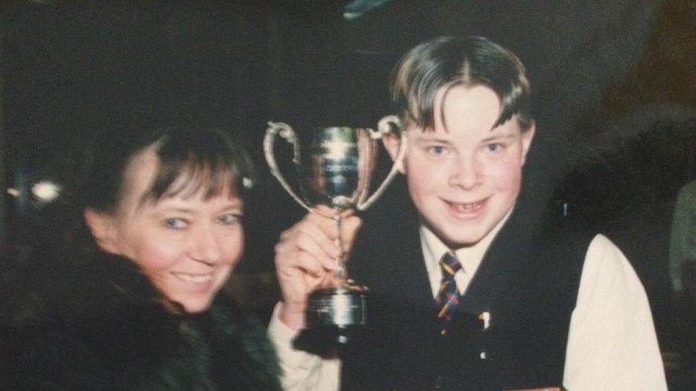 John and his mum after winning a P&O cake competition