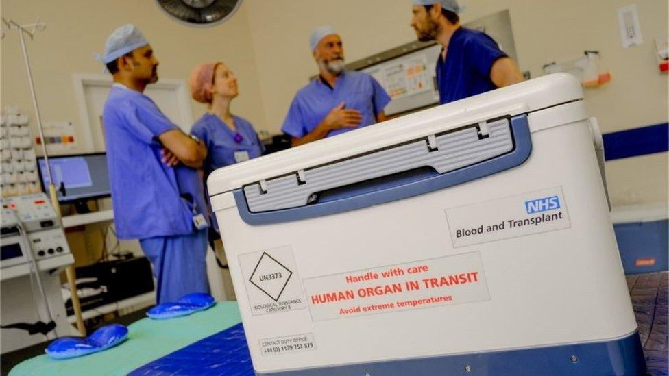 NHS staff and organ being delivered