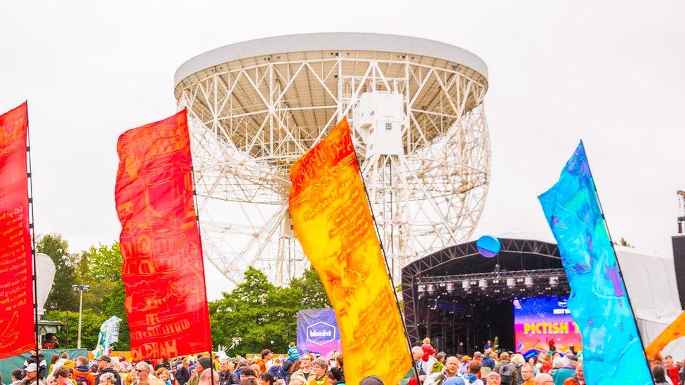 Parade at bluedot with colourful banners