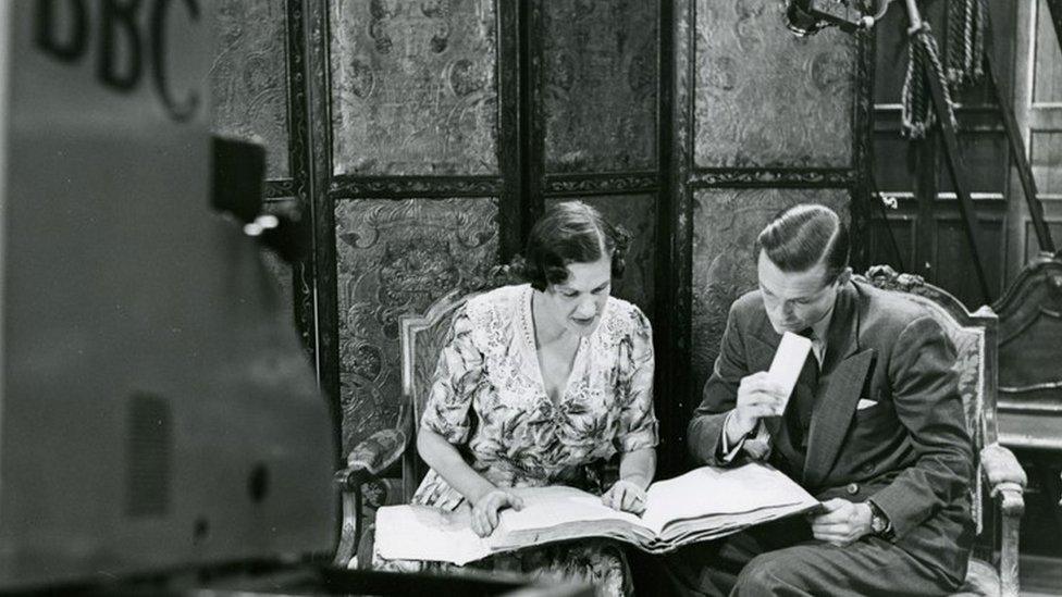 B&w photo of the 6th Marquess and Marchioness filming at Alexandra Palace in 1949