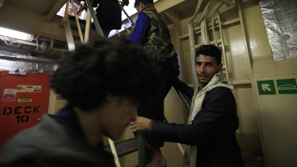 A group of men inside the Galaxy Leader cargo ship, seized by the Houthis offshore of the Al-Salif port on the Red Sea in the province of Hodeidah, Yemen, 05 December 2023.