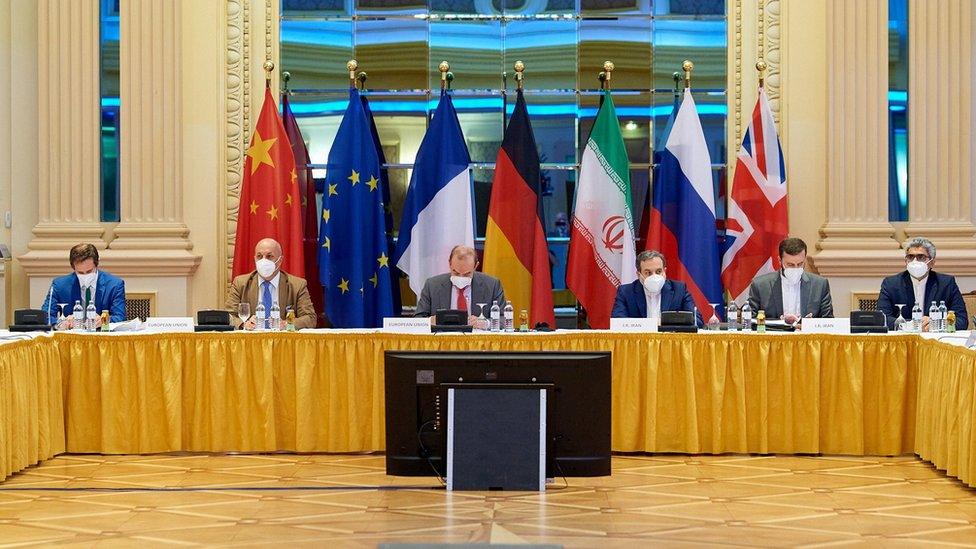 European External Action Service (EEAS) Deputy Secretary General Enrique Mora and Iranian Deputy at Ministry of Foreign Affairs Abbas Araghchi wait for the start of talks on reviving the 2015 Iran nuclear deal in Vienna, Austria (20 June 2021)