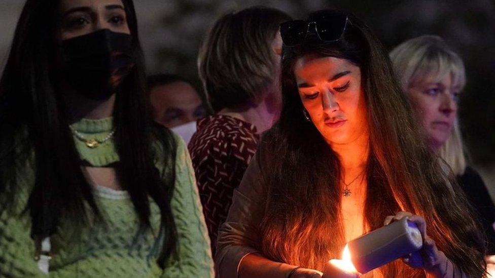 Members of the public attend a vigil in memory of Sabina Nessa,