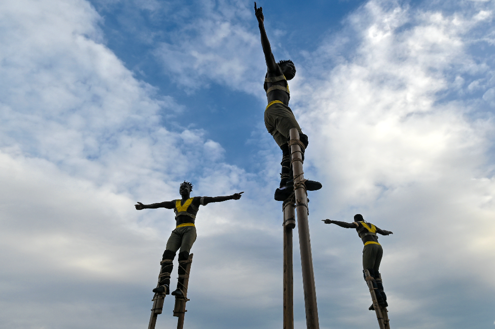 Men on stilts from Togo from a troupe called Afuma performing in Kraków, Poland - Saturday 9 July 2022