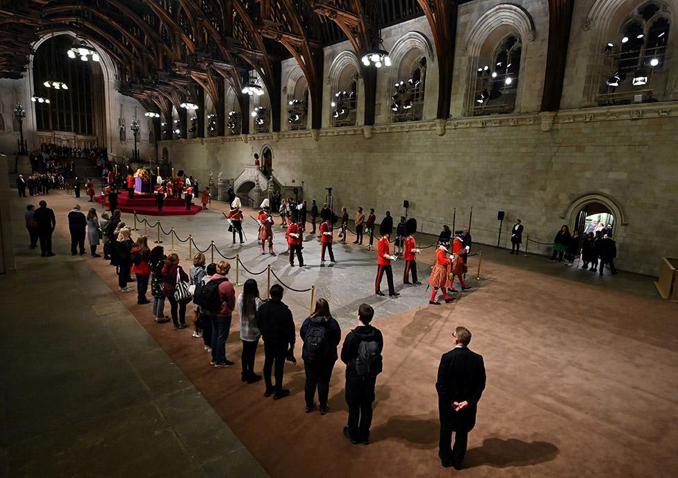 The public view the coffin of Queen Elizabeth II inside Westminster Hall, at the Palace of Westminster