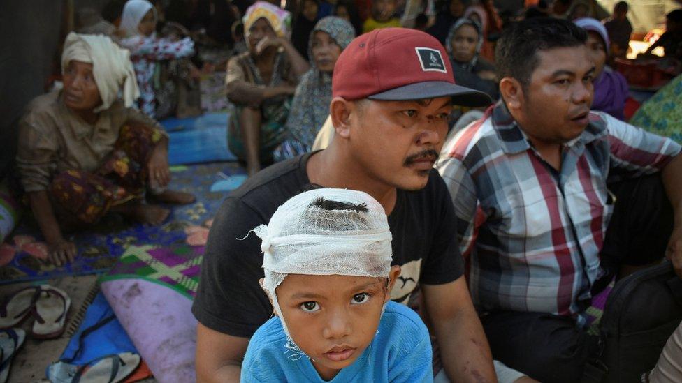 villagers in a camp