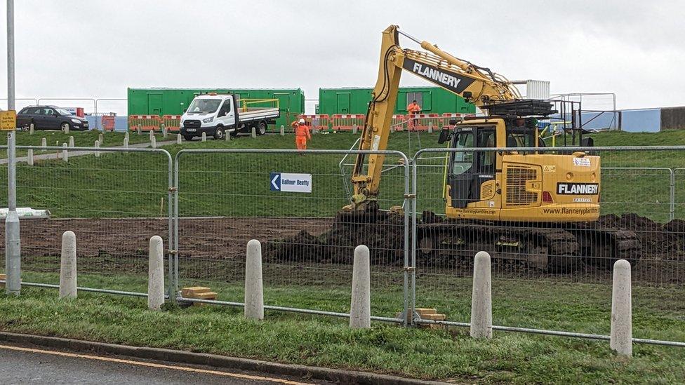 Environment Agency contractors at the Canvey Island sea wall