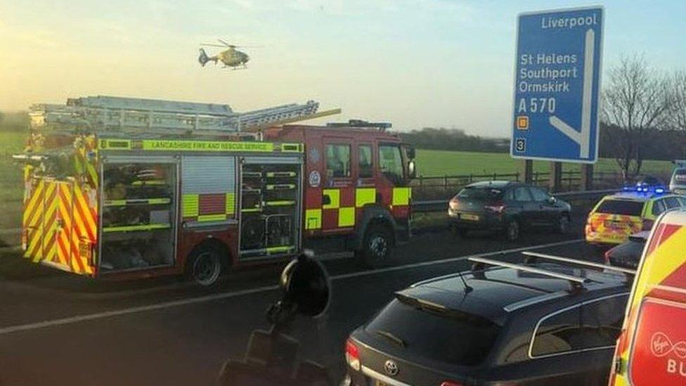 Air ambulance and emergency vehicles on M58