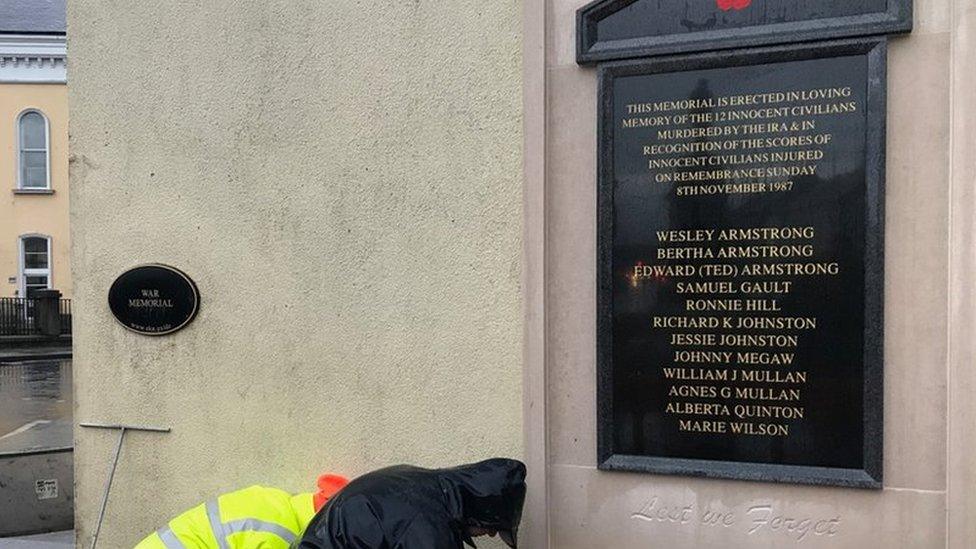 Memorial being installed by workers