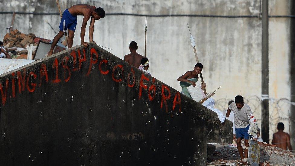 Prisoners during a riot at the Alcacuz Penitentiary Center near Natal in Rio Grande do Norte, Brazil on January 17, 2017.