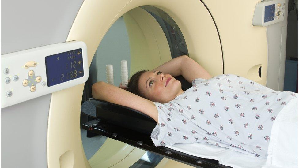 Woman having a scan