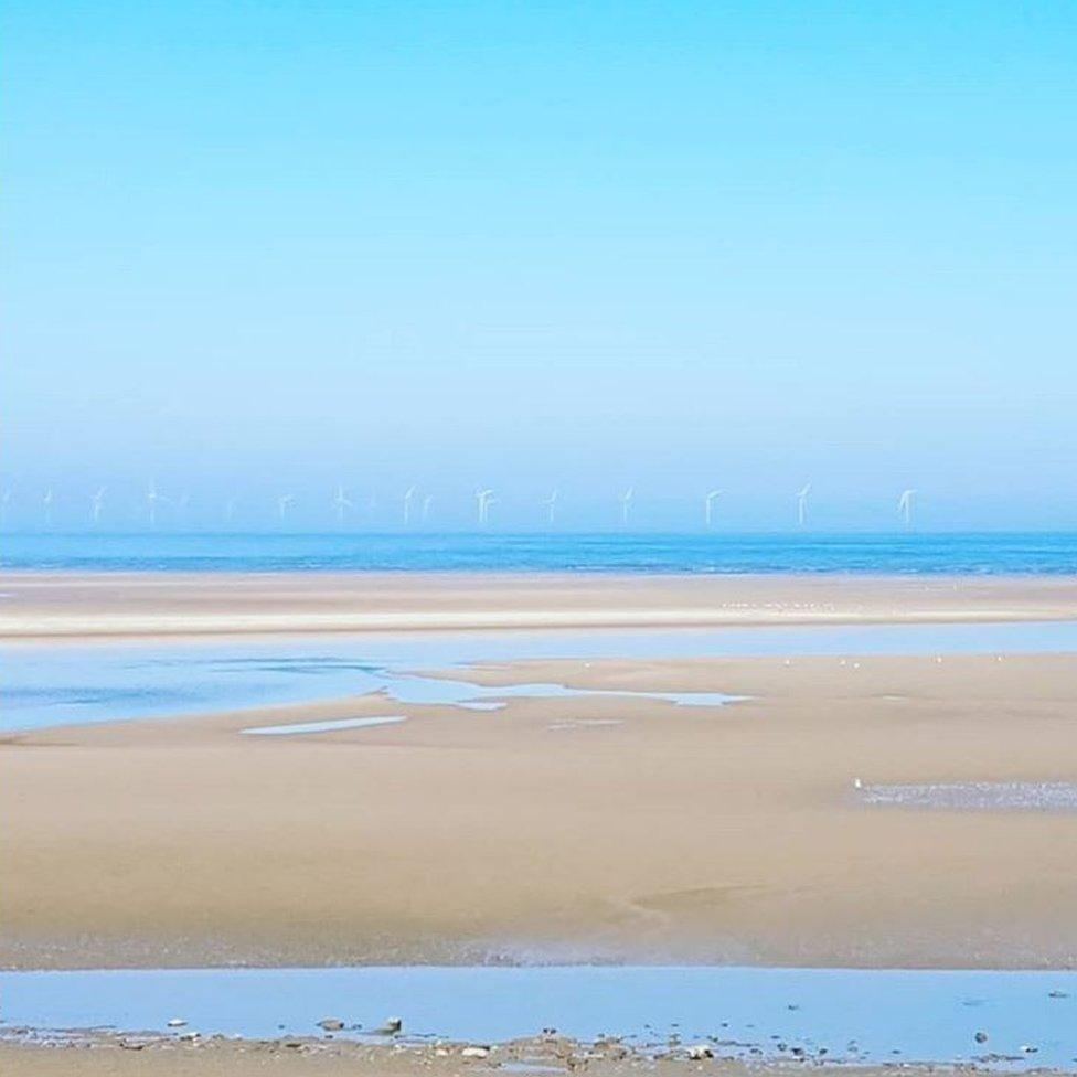 Wind turbines out at sea at Moreton, Wirral