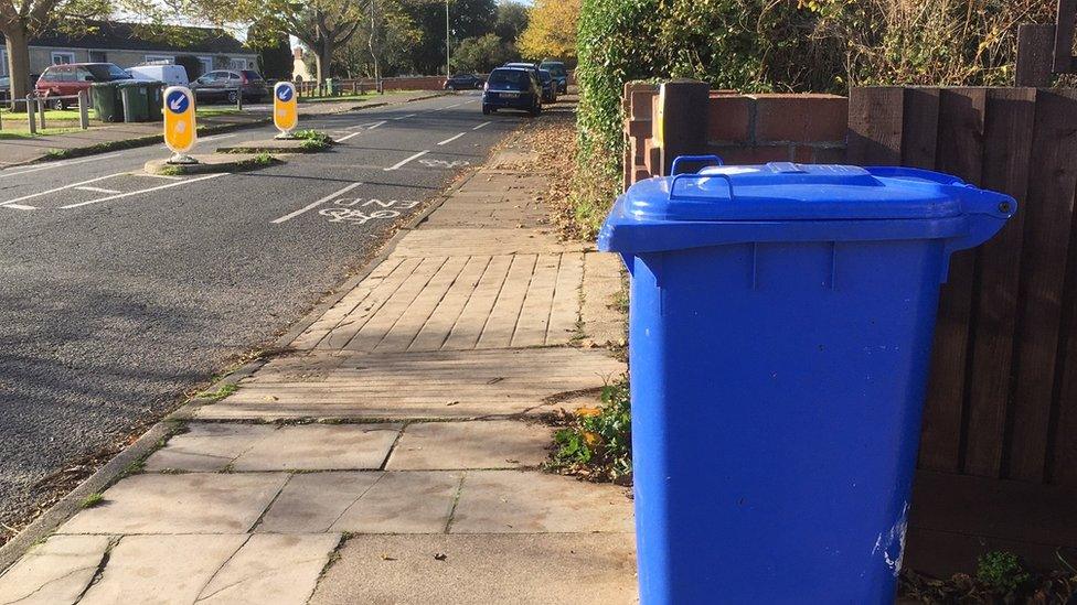 Blue recycling bin