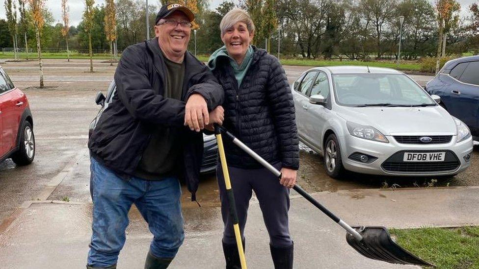 Volunteers clean up flood damage