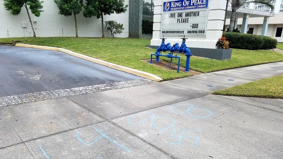 Swastikas and numbers with Nazi symbolism on the church's pavement