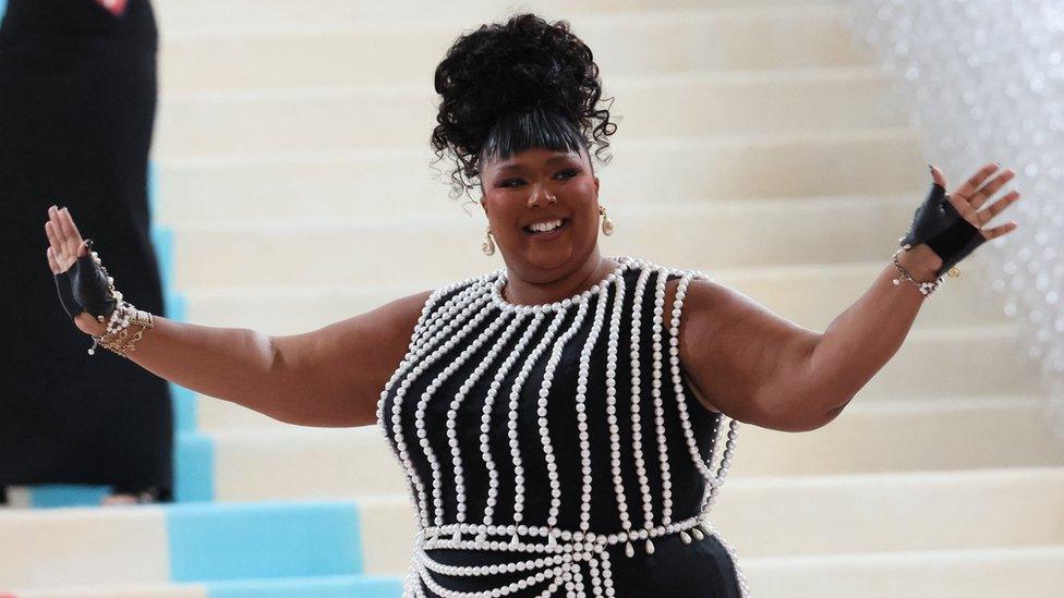 Lizzo poses at the Met Gala, an annual fundraising gala held for the benefit of the Metropolitan Museum of Art's Costume Institute with this year's theme "Karl Lagerfeld: A Line of Beauty", in New York City, New York, U.S., May 1, 2023