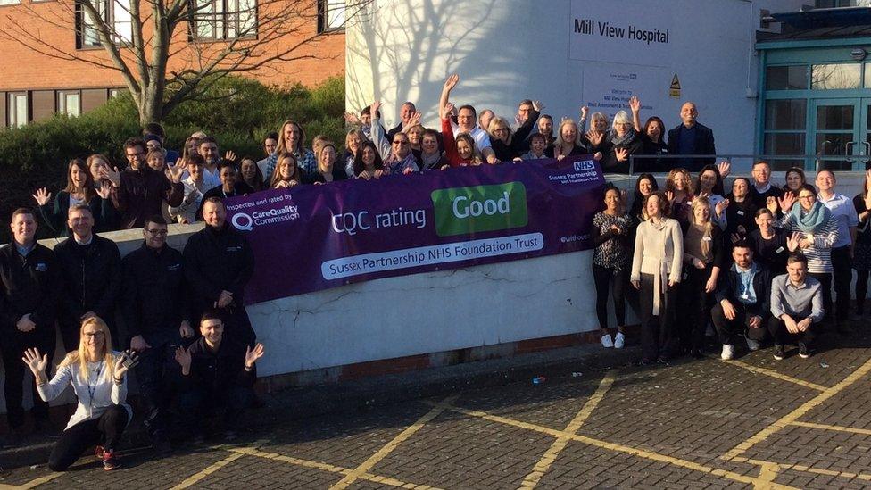 Staff from Sussex Partnership NHS Foundation Trust celebrate their new CQC rating