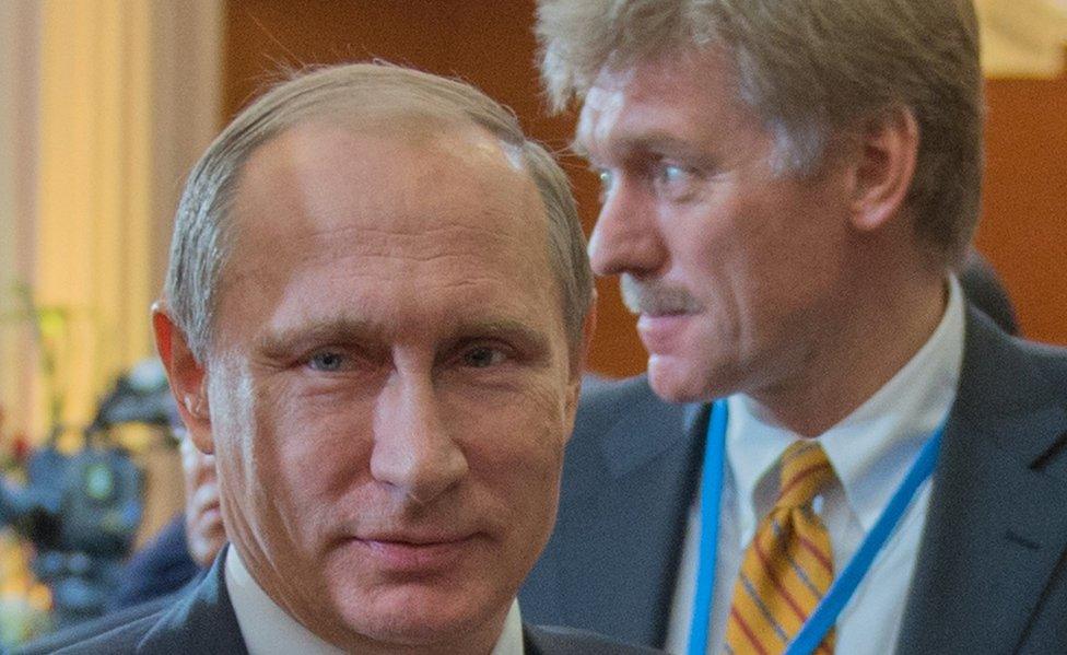 Dmitry Peskov (R) with President Putin (file pic)