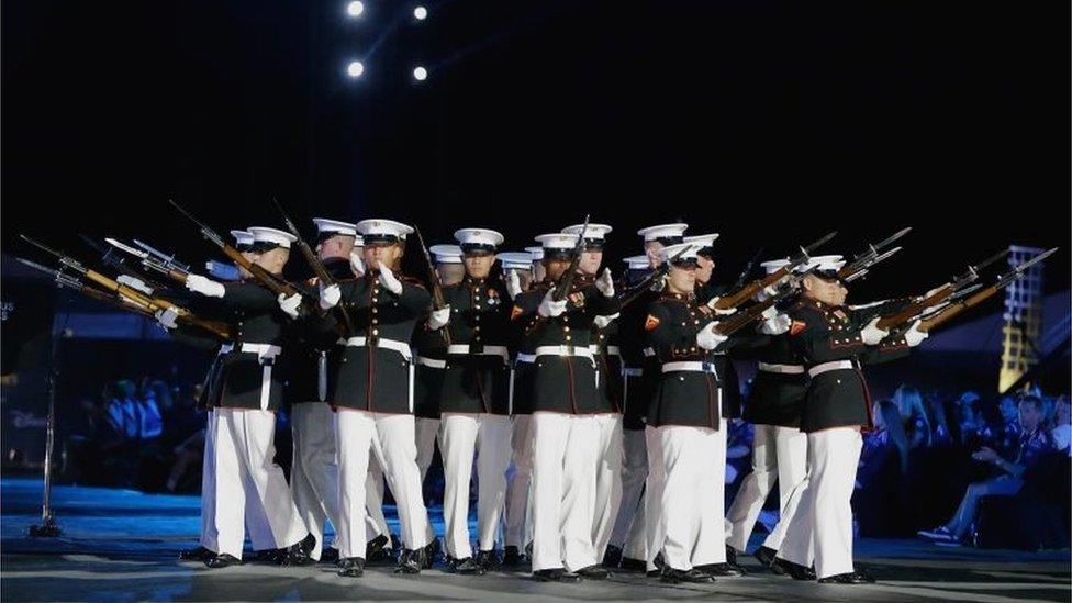 The US Marine Corps silent drill team also performed