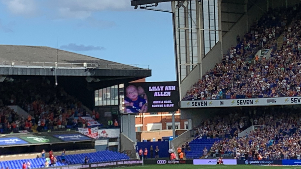 Ipswich town fans clap for Lily Ann Allen at Portman Road