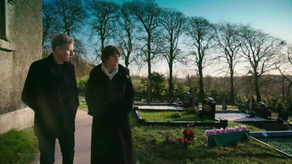 Patrick Kielty and Arlene Foster in a graveyard