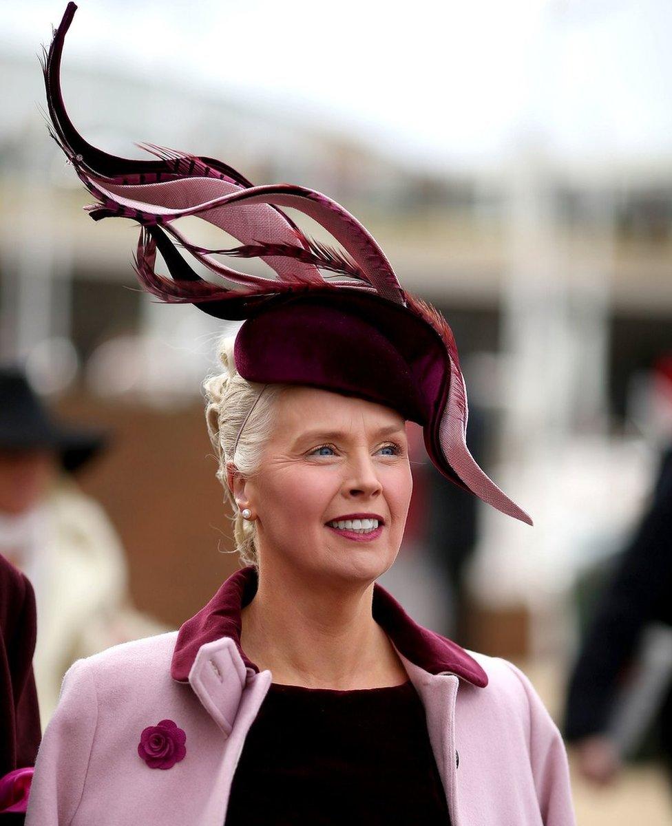 A racegoer during Ladies Day of the 2019 Cheltenham Festival at Cheltenham Racecourse