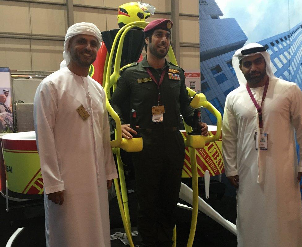 Lt Col Ali Hassan Almutawa (R) and others with a jetpack