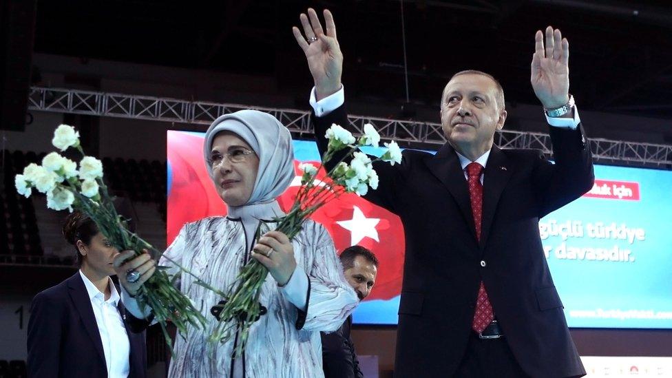 Turkish President Tayyip Erdogan, with his wife Emine Erdogan, greet supporters at a meeting to announce his ruling Ak Party's manifesto for next month's election in Ankara, Turkey, 24 May 2018