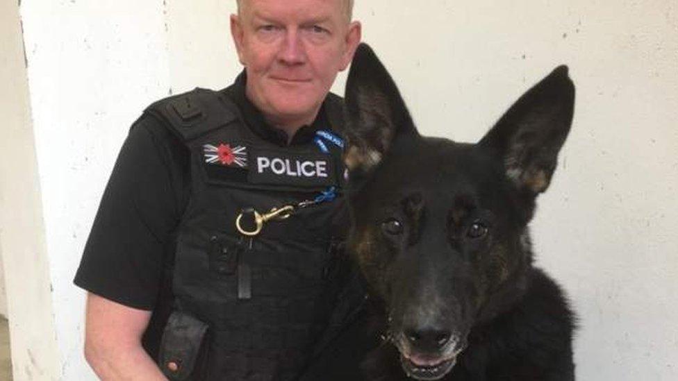 PC Davey in uniform with Bacca